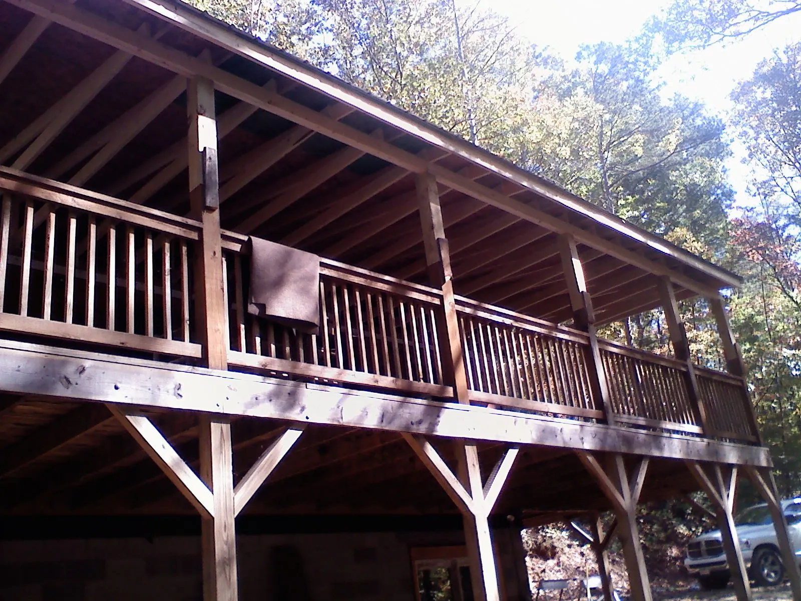 Timber framing under a new elevated porch and deck — Roof Leak Repair in Omega by Roofing Brothers